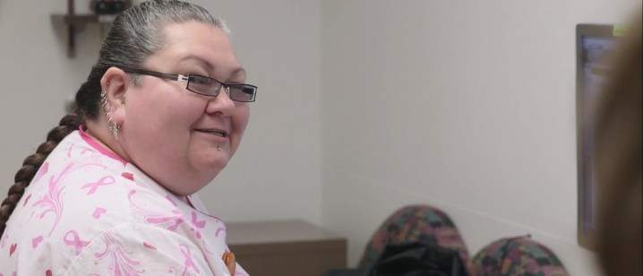 Health care worker at her computer 